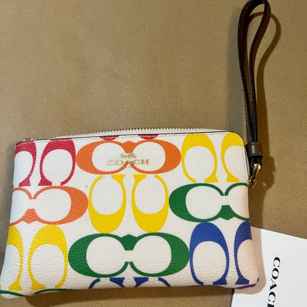 Coach wristlet in rainbow canvas